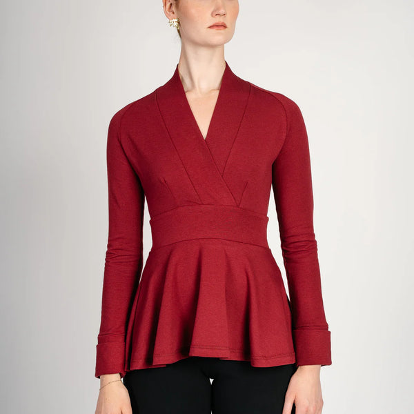 Scarlet peplum top with raglan sleeve